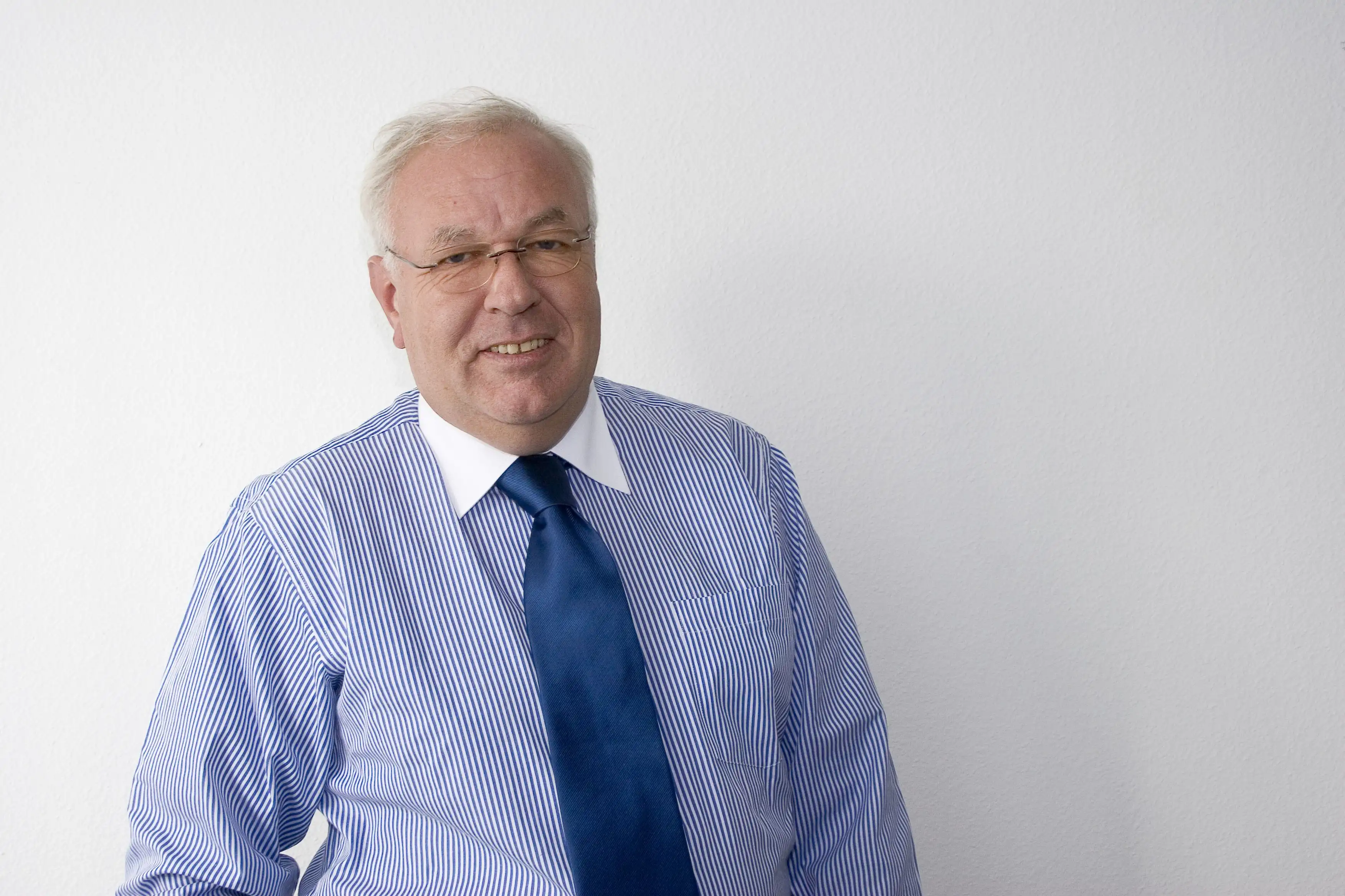 Attractive smiling doctor preparing man for scanning in mri machine